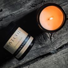Pot en verre ambré d'apothicaire avec mèche en bois