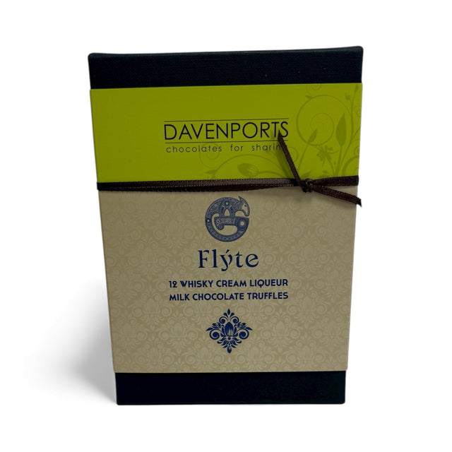 Davenports box of 12 Flyte milk chocolate cream liqueur truffles with green and cream-coloured packaging and a dark ribbon.


